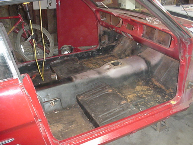 Inside of Car with seats and carpet removed